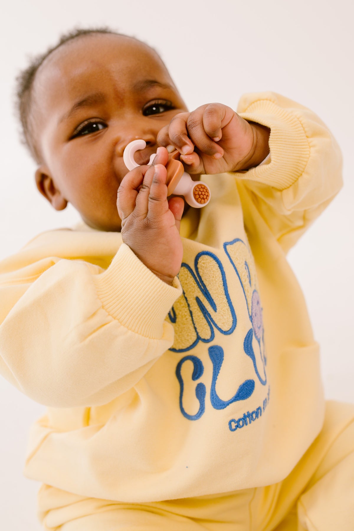 Difrax - Crown Teether - Baby Chewing on Part of Teether