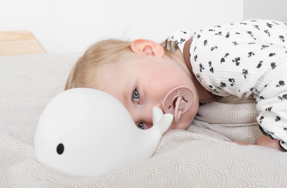 Moby Night Light (White) - with resting child