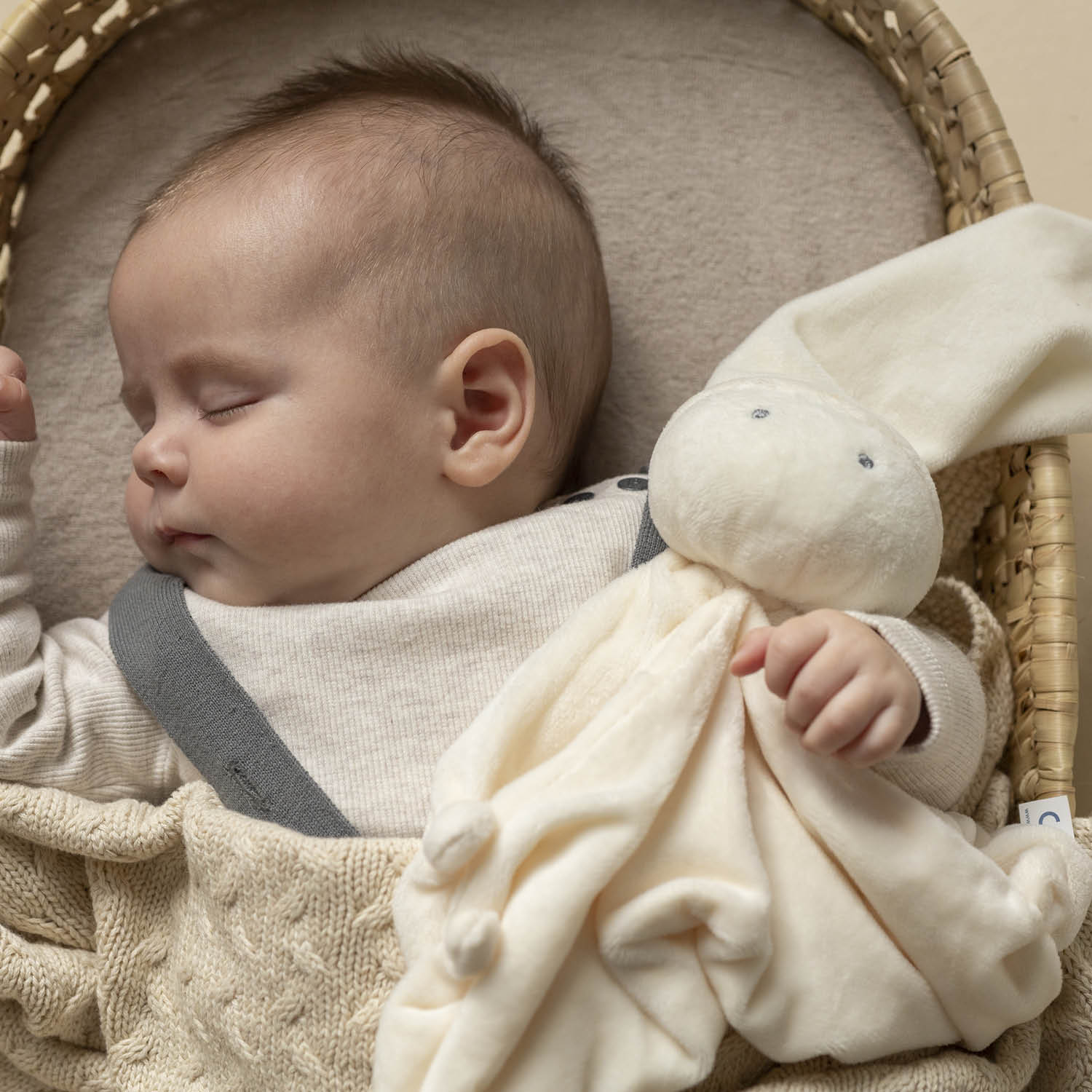 Difrax Baby Comforter - Popcorn in Baby's arms