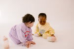 Difrax Lovi - Mammafeel Bottle - Babies Sitting on Floor with Crown Teether & S-Bottle