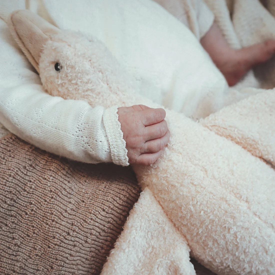 Liva Comforter - Closeup In Babys Arms - Beige