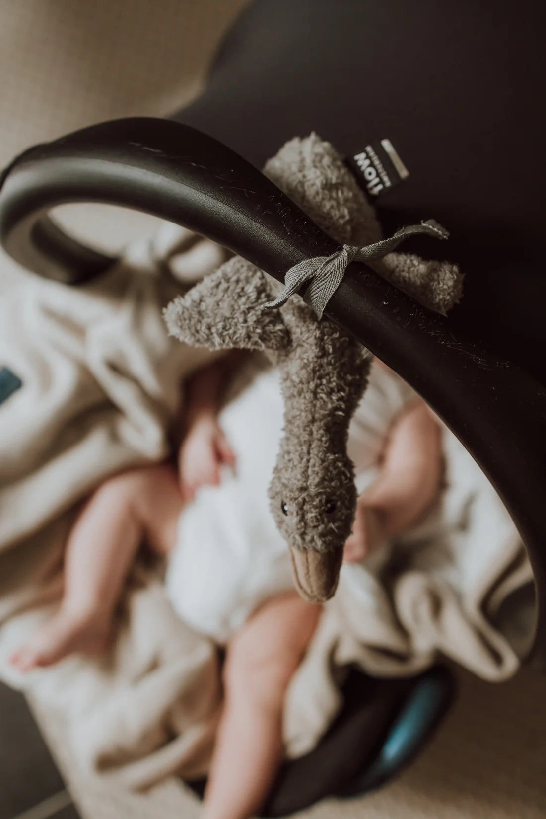Liva Heartbeat Comforter OTG - Tied to Baby Carrier with Baby - Grey
