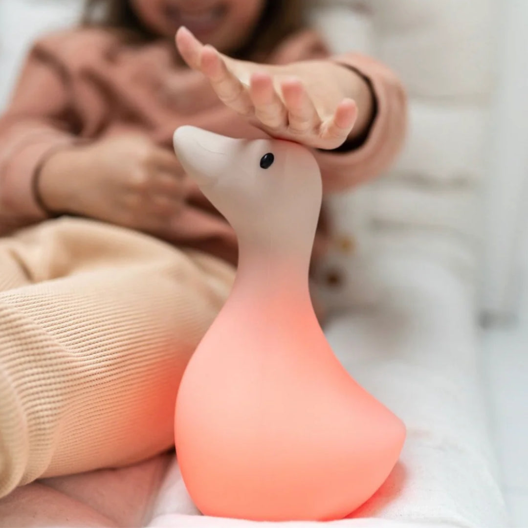 Liva Night Light - Girl Touching Head with Red Light On - Beige