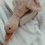 Liva Comforter - Closeup of Head on Bed - Brown