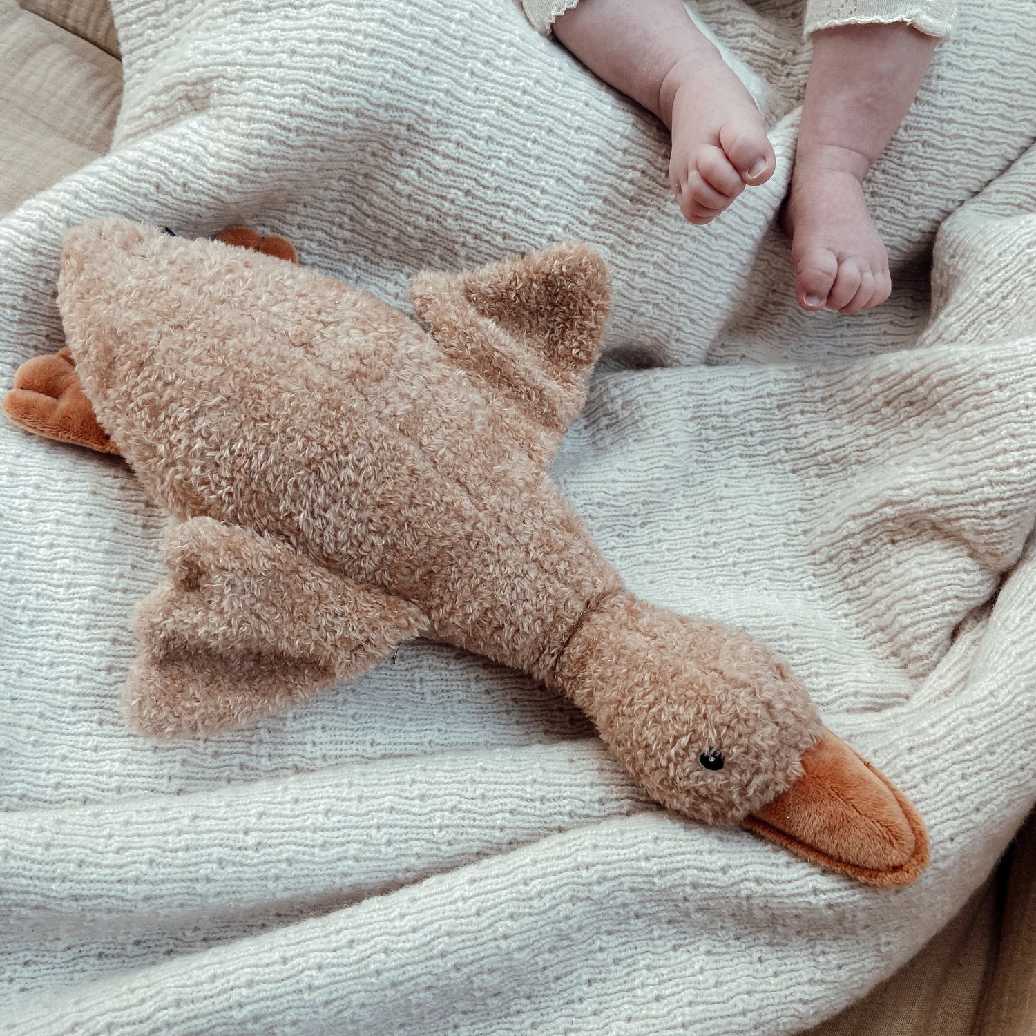 Liva Comforter - On Bed with Babys Feet - Brown