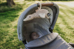 Liva Heartbeat Comforter OTG - Tied to Pram with Baby - Oat